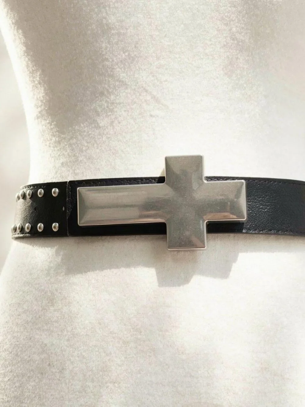 Y2K 2000s style Black leather studded cross belt with silver hardware